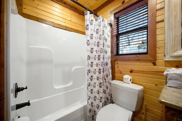 bathroom featuring toilet, wooden walls, shower / tub combo, and wooden ceiling