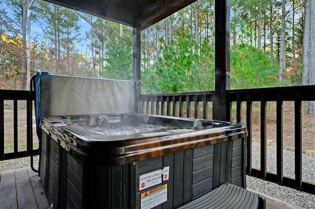 deck with a hot tub