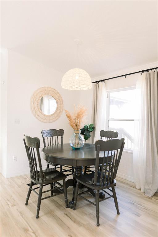 dining room with light hardwood / wood-style floors