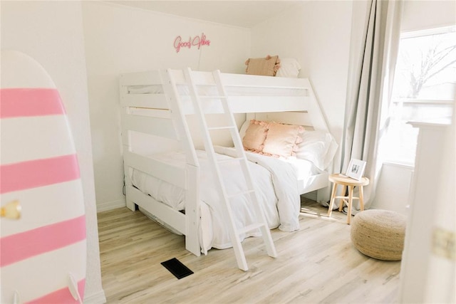 bedroom featuring hardwood / wood-style flooring