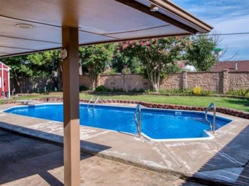 view of pool with a patio