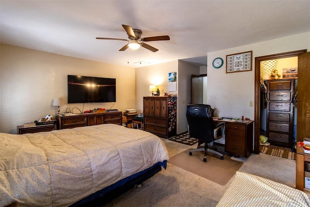 carpeted bedroom featuring ceiling fan