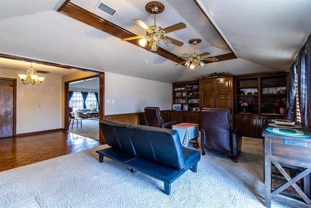 living area with lofted ceiling, ceiling fan with notable chandelier, and visible vents