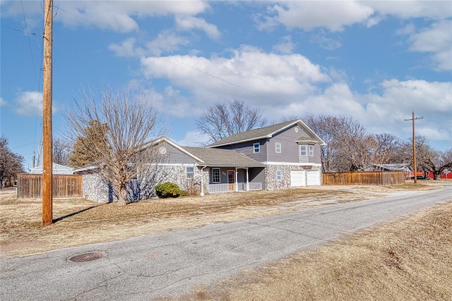 view of front of property with a garage