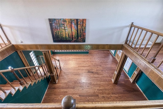 staircase featuring hardwood / wood-style floors