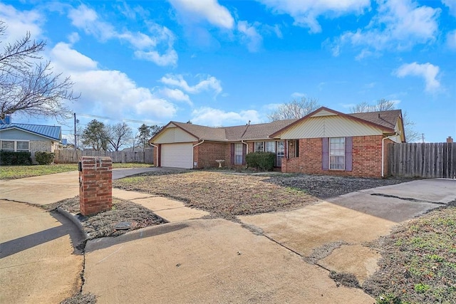 single story home featuring a garage