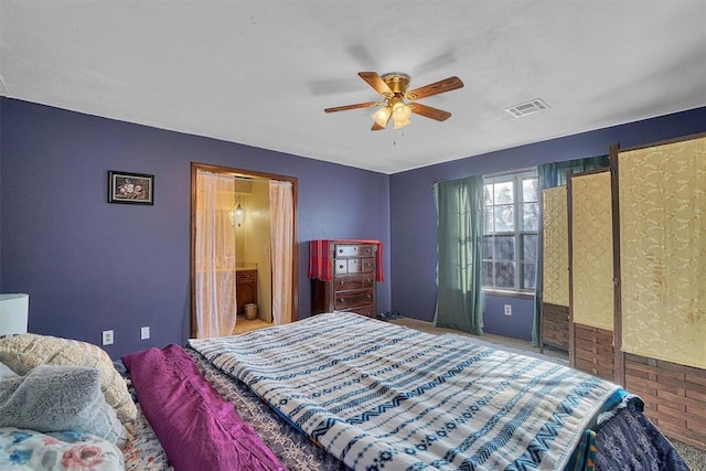 carpeted bedroom featuring ceiling fan