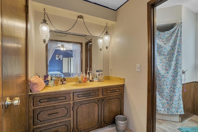 bathroom featuring vanity and a textured ceiling