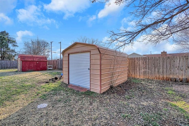 view of outbuilding featuring a yard