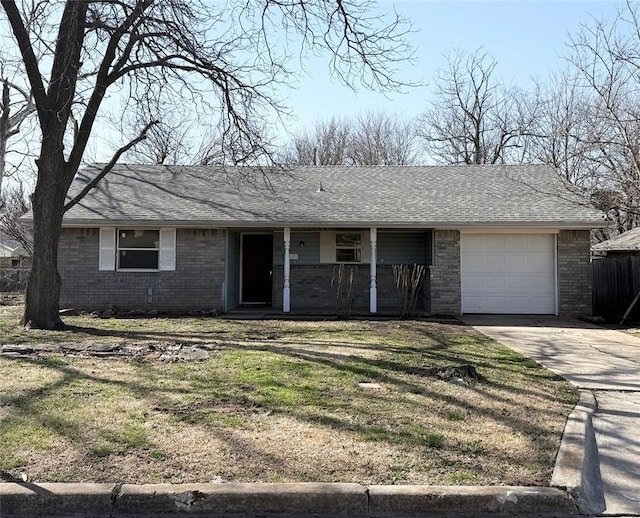 single story home featuring brick siding, covered porch, driveway, and an attached garage