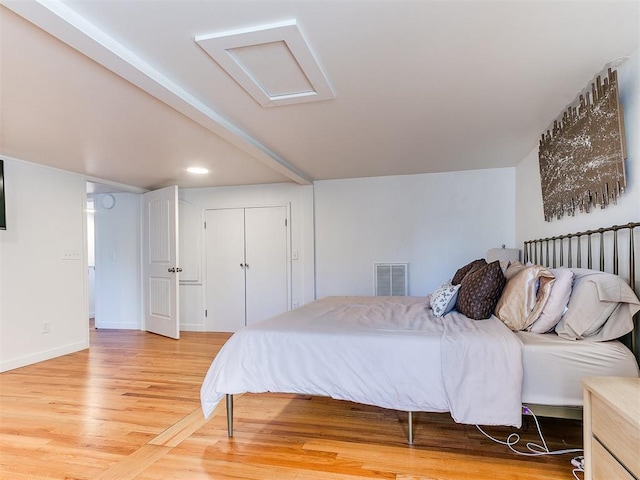 bedroom featuring wood-type flooring