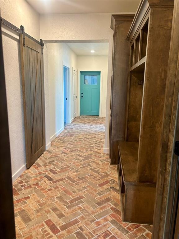 mudroom with a barn door