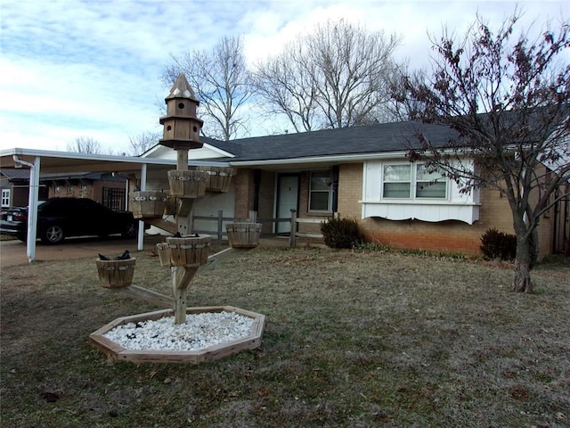 view of front of house featuring a carport