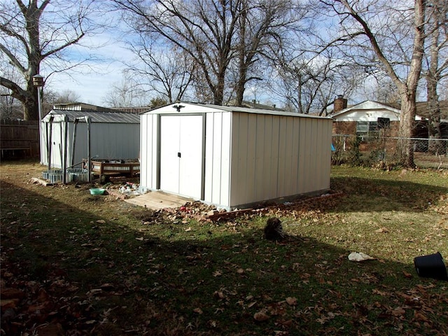 view of outdoor structure with a lawn