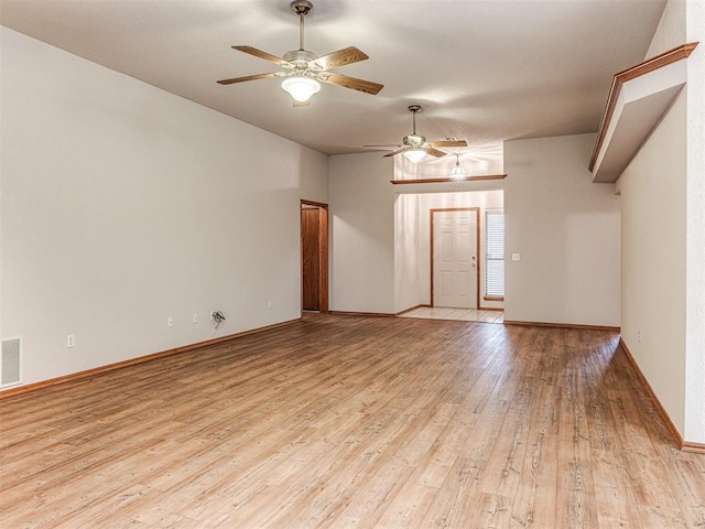 unfurnished room featuring ceiling fan and light wood-type flooring