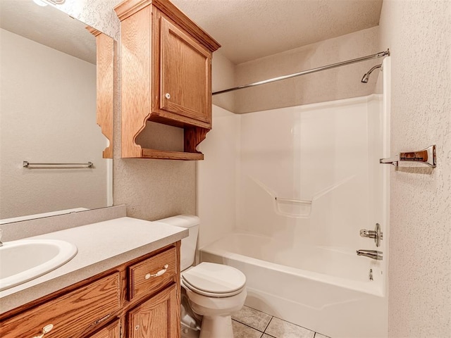 full bathroom with toilet, a textured ceiling, shower / tub combination, vanity, and tile patterned flooring