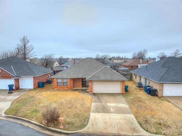 single story home with a garage