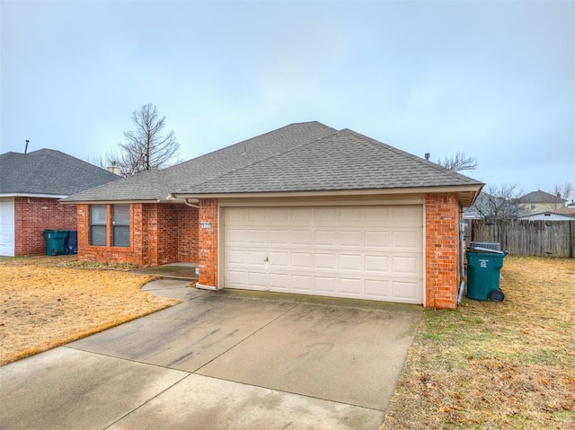 single story home with a garage