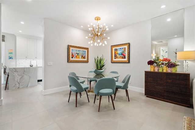 dining room with a chandelier