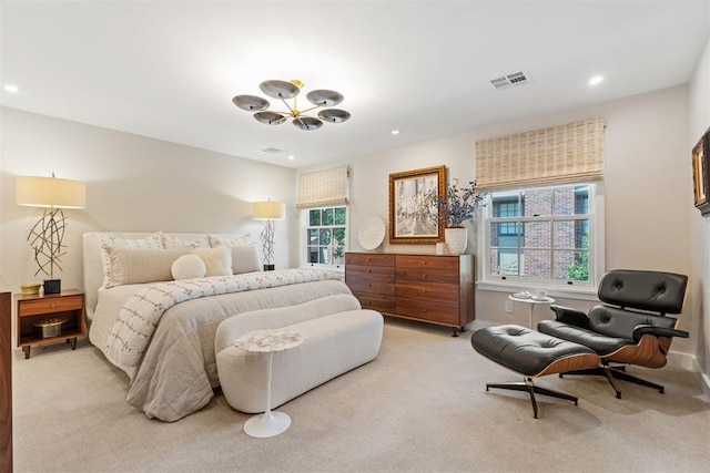 bedroom featuring light colored carpet