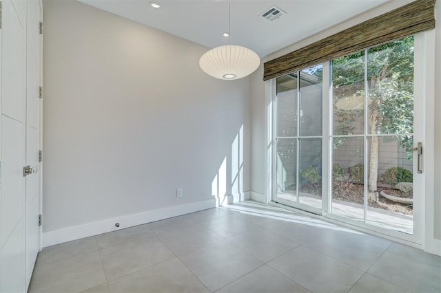 view of tiled spare room