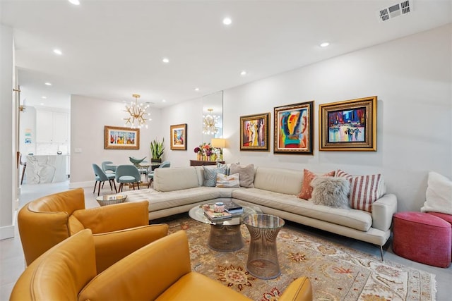 living room featuring a notable chandelier