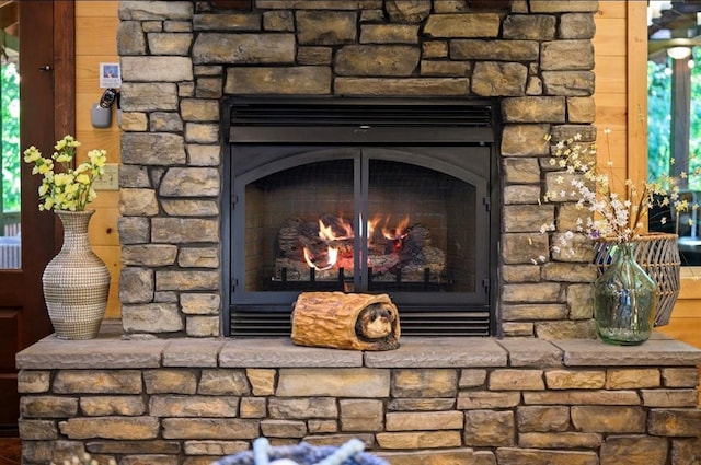 room details featuring a stone fireplace