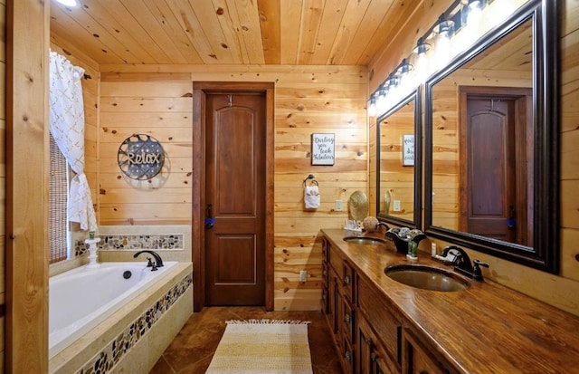 bathroom featuring tile patterned flooring, vanity, a relaxing tiled tub, and wooden ceiling