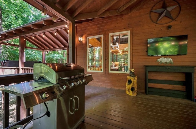 wooden terrace featuring ceiling fan