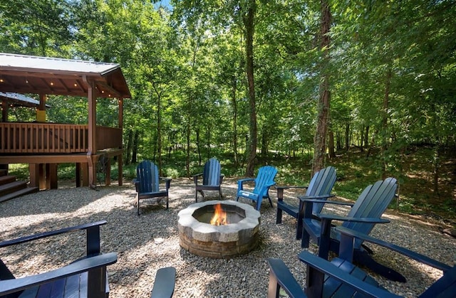 view of patio / terrace with a fire pit