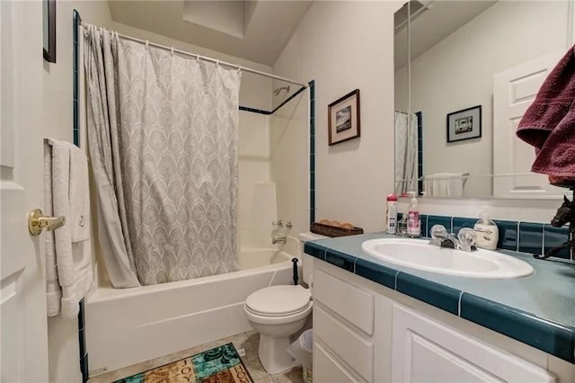 full bathroom featuring shower / tub combo with curtain, vanity, toilet, and tile patterned floors