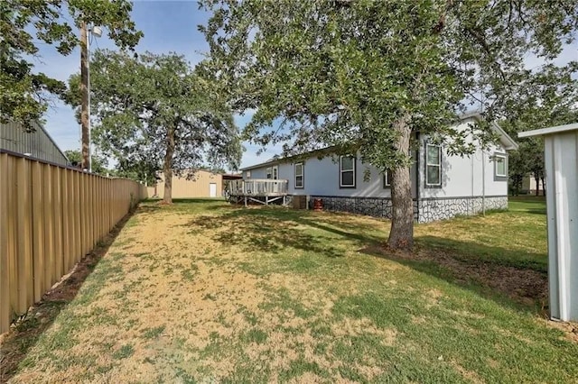 view of yard featuring a deck