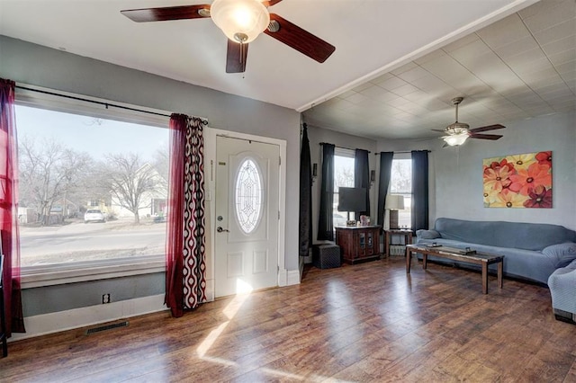 entrance foyer with dark hardwood / wood-style floors and ceiling fan