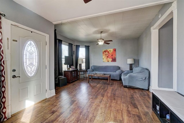 entrance foyer featuring dark hardwood / wood-style flooring and ceiling fan