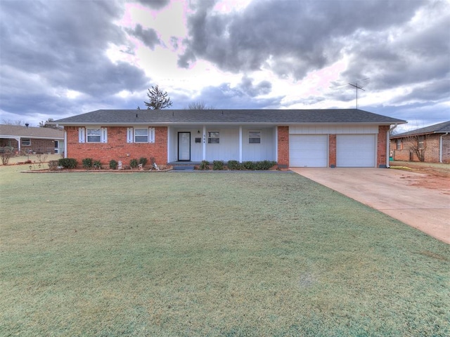 ranch-style house featuring a garage and a front yard