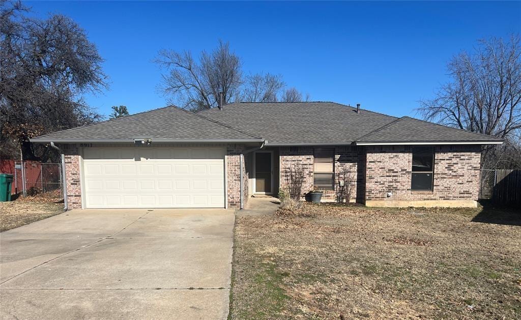 single story home with a garage