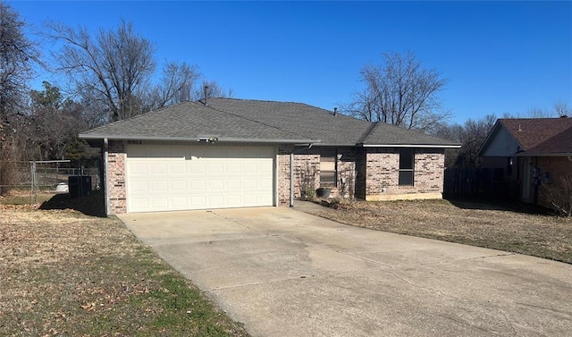 single story home with a garage