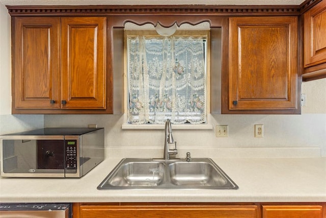 kitchen featuring sink and appliances with stainless steel finishes