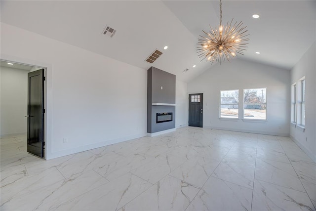 unfurnished living room featuring lofted ceiling and a notable chandelier