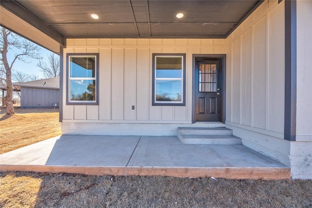 entrance to property with a patio area