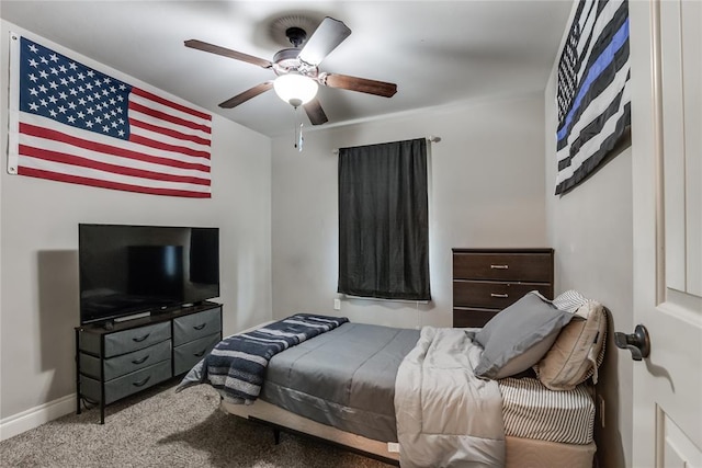 bedroom featuring ceiling fan and carpet floors