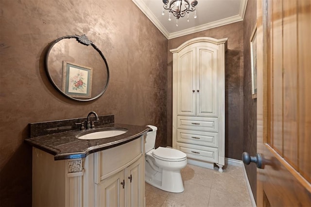 bathroom with toilet, crown molding, a chandelier, vanity, and tile patterned flooring