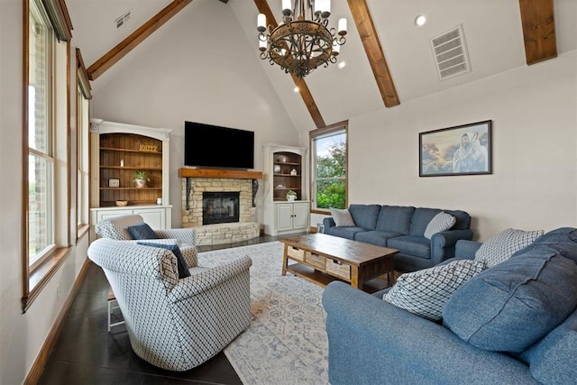 living room with beam ceiling, a fireplace, and high vaulted ceiling