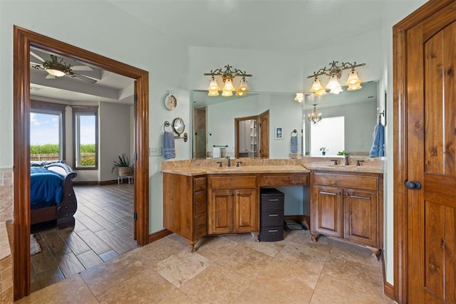 bathroom featuring ceiling fan and vanity