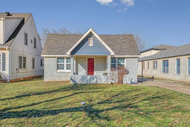 view of front of property with a front lawn