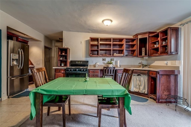 interior space featuring sink and light tile patterned floors