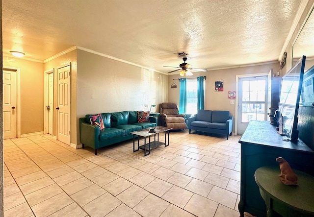 tiled living room featuring crown molding, ceiling fan, and a textured ceiling