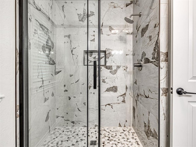 bathroom with an enclosed shower