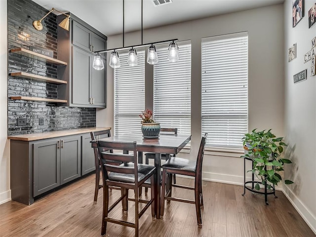 dining room featuring light hardwood / wood-style floors