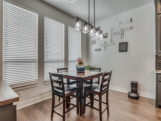 dining room featuring light hardwood / wood-style floors